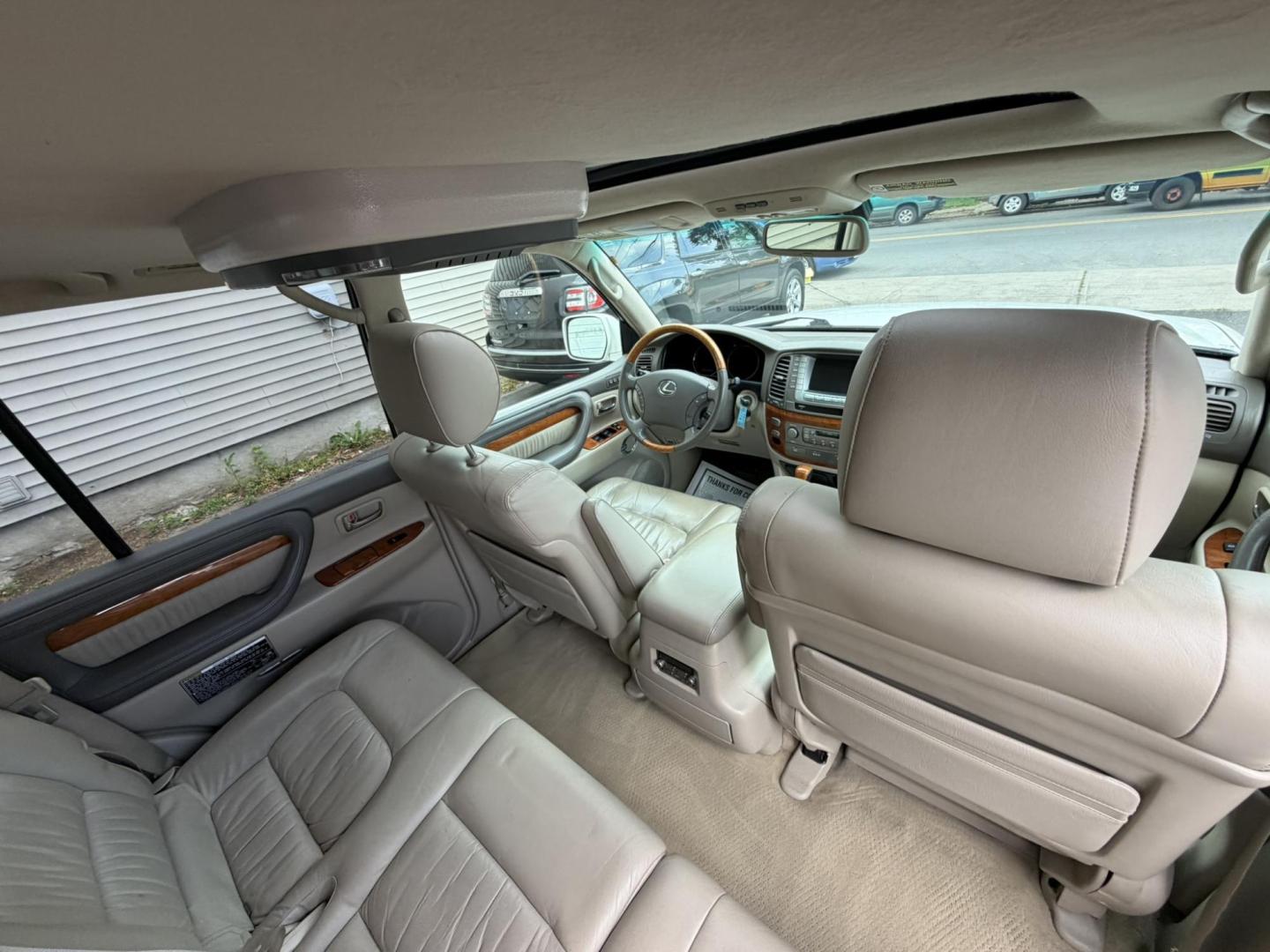 2004 White /Tan Leather Lexus LX 470 Sport Utility (JTJHT00W043) with an 4.7L V8 DOHC 32V engine, 5-Speed Automatic Overdrive transmission, located at 1018 Brunswick Ave, Trenton, NJ, 08638, (609) 989-0900, 40.240086, -74.748085 - Here is a really Rare 1 owner Lexus SUV! Freshly detailed and serviced and ready for another 100k or more miles! Lots of consistent service history on this LX470! Please call Anthony to set an appt. as this will not last long on the lot! 609-273-5100- Photo#20