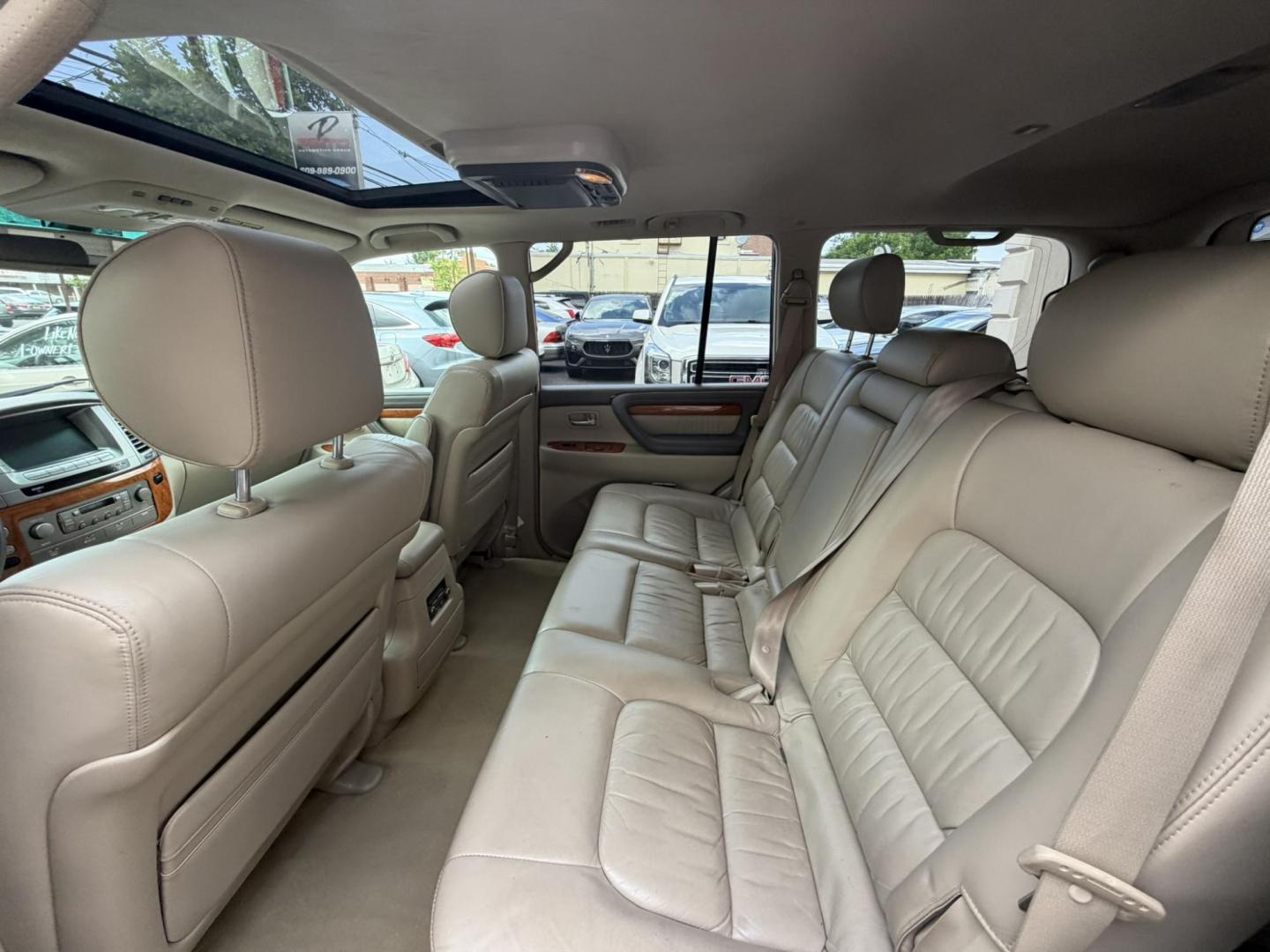 2004 White /Tan Leather Lexus LX 470 Sport Utility (JTJHT00W043) with an 4.7L V8 DOHC 32V engine, 5-Speed Automatic Overdrive transmission, located at 1018 Brunswick Ave, Trenton, NJ, 08638, (609) 989-0900, 40.240086, -74.748085 - Here is a really Rare 1 owner Lexus SUV! Freshly detailed and serviced and ready for another 100k or more miles! Lots of consistent service history on this LX470! Please call Anthony to set an appt. as this will not last long on the lot! 609-273-5100- Photo#27