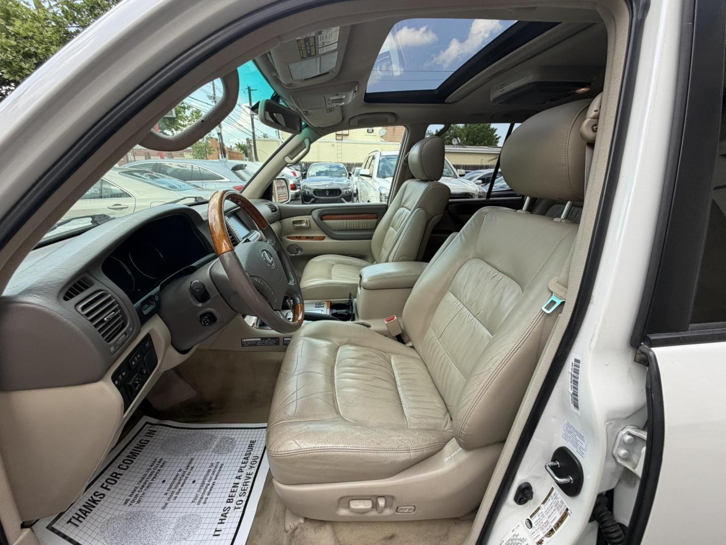 2004 White /Tan Leather Lexus LX 470 Sport Utility (JTJHT00W043) with an 4.7L V8 DOHC 32V engine, 5-Speed Automatic Overdrive transmission, located at 1018 Brunswick Ave, Trenton, NJ, 08638, (609) 989-0900, 40.240086, -74.748085 - Here is a really Rare 1 owner Lexus SUV! Freshly detailed and serviced and ready for another 100k or more miles! Lots of consistent service history on this LX470! Please call Anthony to set an appt. as this will not last long on the lot! 609-273-5100- Photo#30