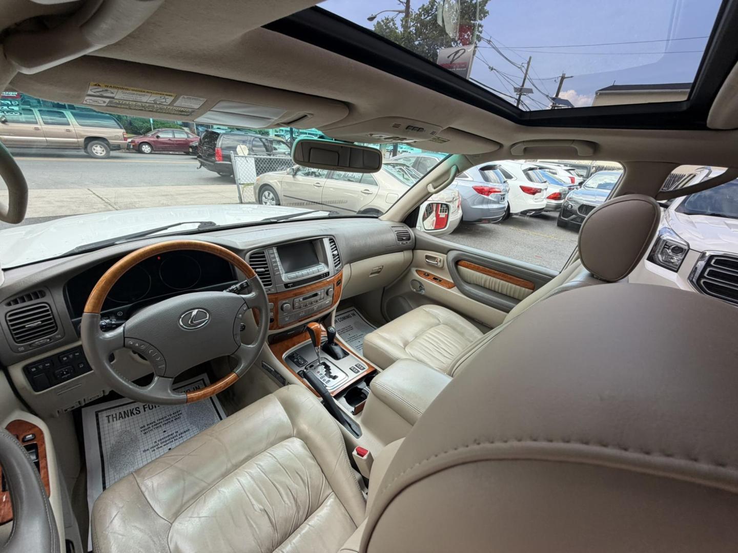 2004 White /Tan Leather Lexus LX 470 Sport Utility (JTJHT00W043) with an 4.7L V8 DOHC 32V engine, 5-Speed Automatic Overdrive transmission, located at 1018 Brunswick Ave, Trenton, NJ, 08638, (609) 989-0900, 40.240086, -74.748085 - Here is a really Rare 1 owner Lexus SUV! Freshly detailed and serviced and ready for another 100k or more miles! Lots of consistent service history on this LX470! Please call Anthony to set an appt. as this will not last long on the lot! 609-273-5100- Photo#29