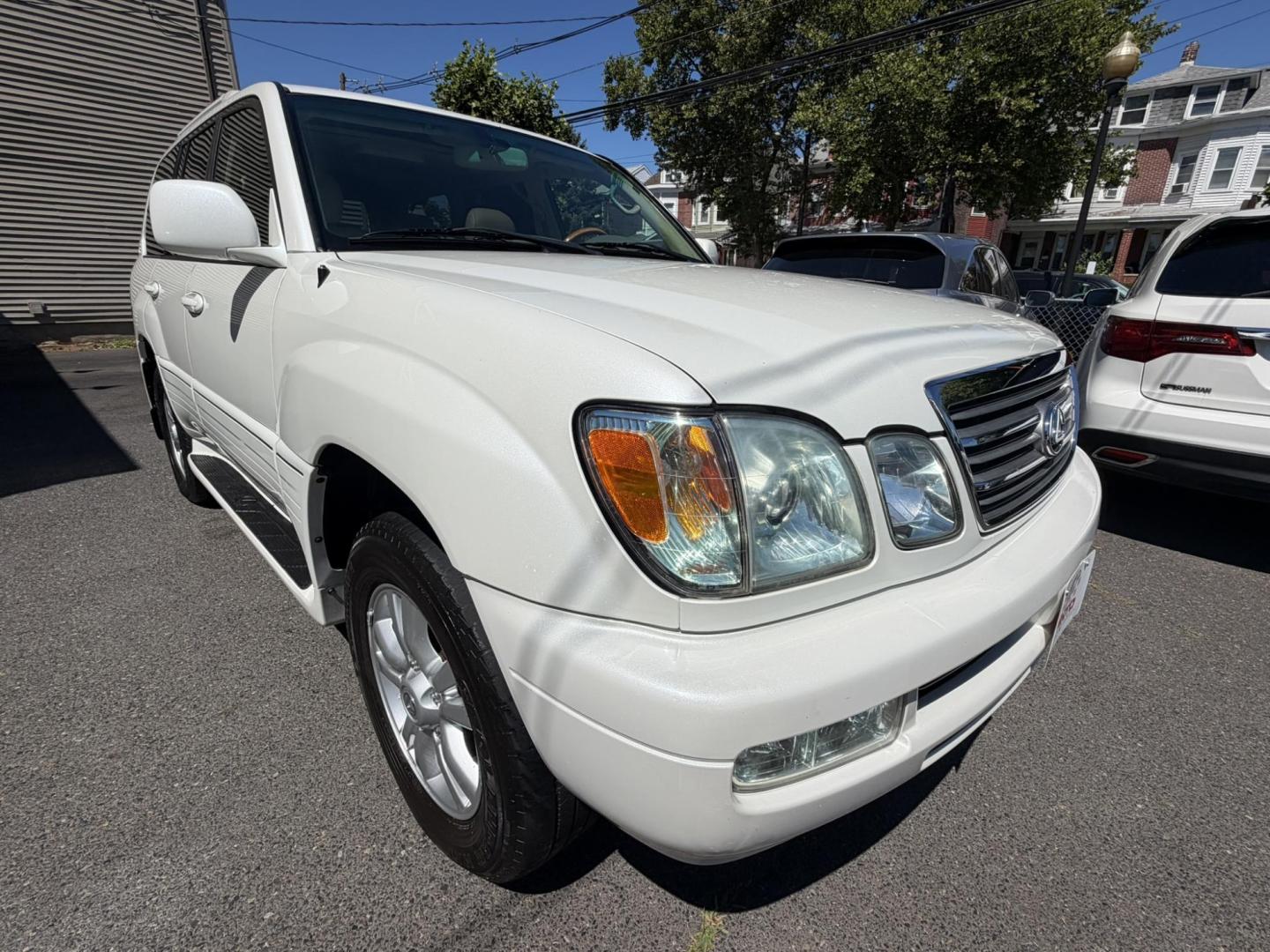 2004 White /Tan Leather Lexus LX 470 Sport Utility (JTJHT00W043) with an 4.7L V8 DOHC 32V engine, 5-Speed Automatic Overdrive transmission, located at 1018 Brunswick Ave, Trenton, NJ, 08638, (609) 989-0900, 40.240086, -74.748085 - Here is a really Rare 1 owner Lexus SUV! Freshly detailed and serviced and ready for another 100k or more miles! Lots of consistent service history on this LX470! Please call Anthony to set an appt. as this will not last long on the lot! 609-273-5100- Photo#33