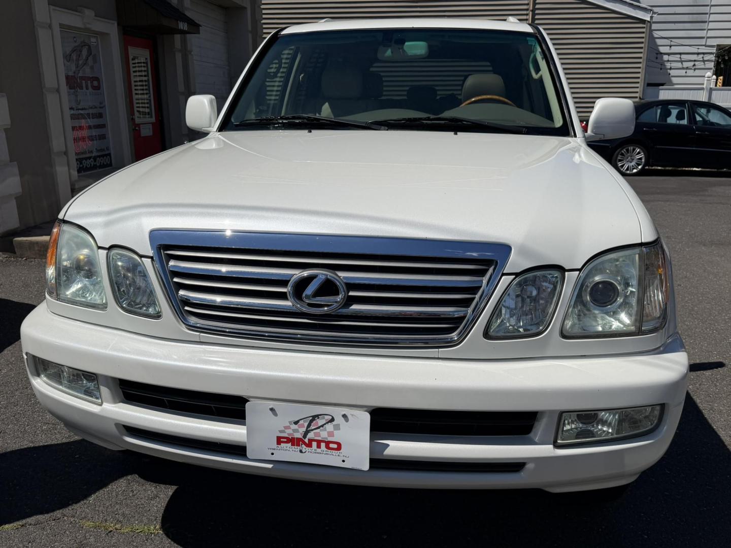 2004 White /Tan Leather Lexus LX 470 Sport Utility (JTJHT00W043) with an 4.7L V8 DOHC 32V engine, 5-Speed Automatic Overdrive transmission, located at 1018 Brunswick Ave, Trenton, NJ, 08638, (609) 989-0900, 40.240086, -74.748085 - Here is a really Rare 1 owner Lexus SUV! Freshly detailed and serviced and ready for another 100k or more miles! Lots of consistent service history on this LX470! Please call Anthony to set an appt. as this will not last long on the lot! 609-273-5100- Photo#35