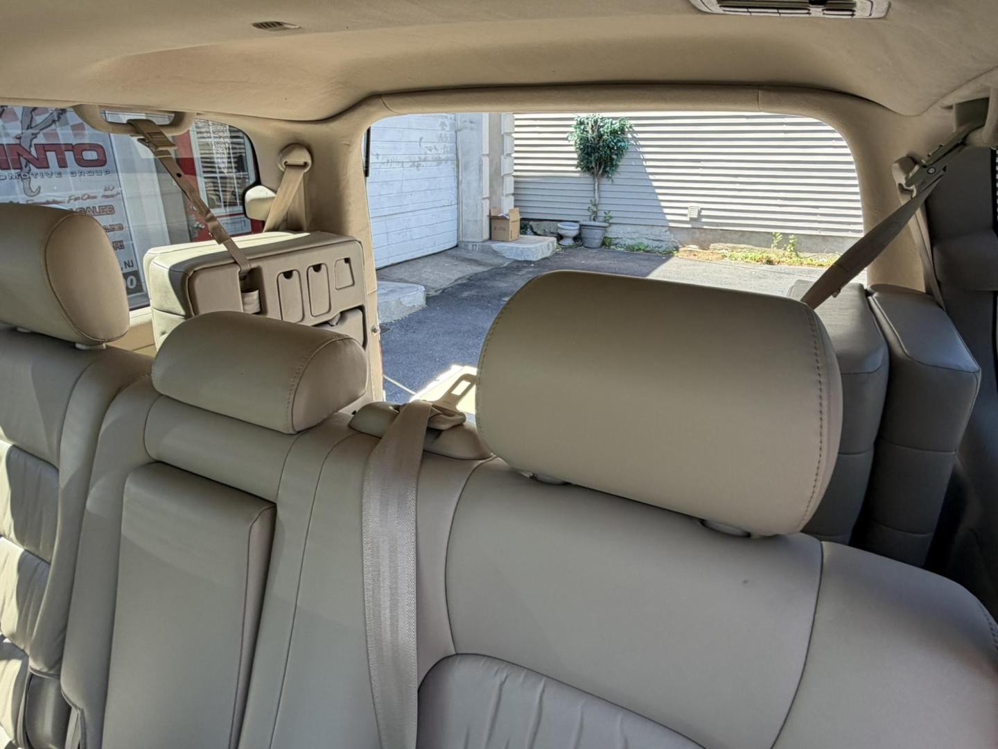 2004 White /Tan Leather Lexus LX 470 Sport Utility (JTJHT00W043) with an 4.7L V8 DOHC 32V engine, 5-Speed Automatic Overdrive transmission, located at 1018 Brunswick Ave, Trenton, NJ, 08638, (609) 989-0900, 40.240086, -74.748085 - Here is a really Rare 1 owner Lexus SUV! Freshly detailed and serviced and ready for another 100k or more miles! Lots of consistent service history on this LX470! Please call Anthony to set an appt. as this will not last long on the lot! 609-273-5100- Photo#40