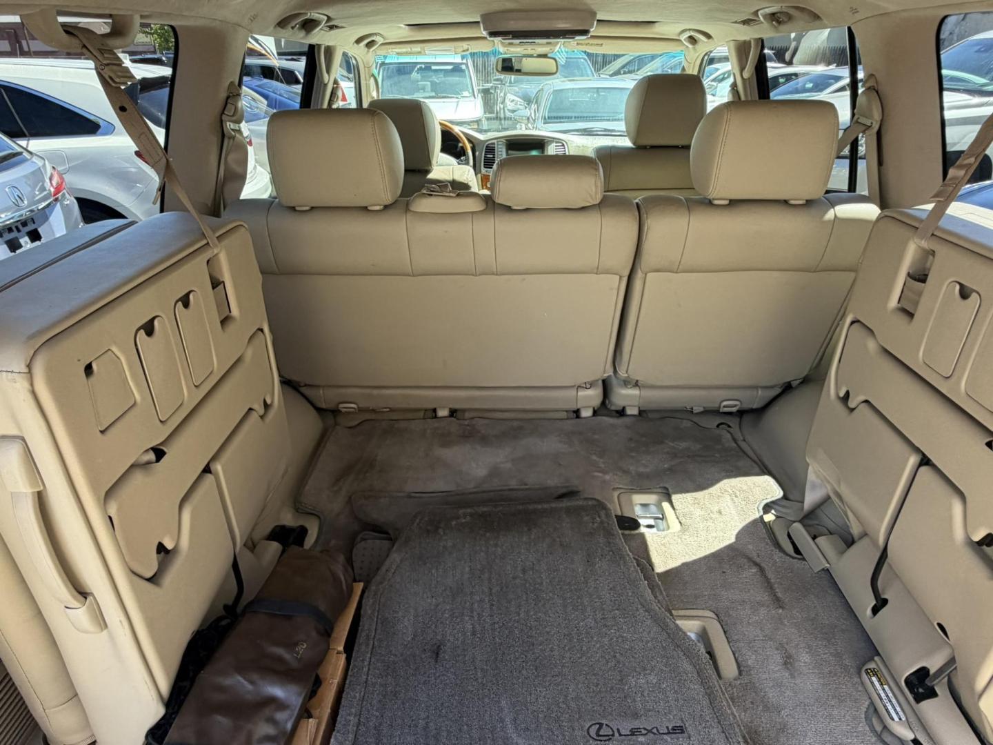 2004 White /Tan Leather Lexus LX 470 Sport Utility (JTJHT00W043) with an 4.7L V8 DOHC 32V engine, 5-Speed Automatic Overdrive transmission, located at 1018 Brunswick Ave, Trenton, NJ, 08638, (609) 989-0900, 40.240086, -74.748085 - Here is a really Rare 1 owner Lexus SUV! Freshly detailed and serviced and ready for another 100k or more miles! Lots of consistent service history on this LX470! Please call Anthony to set an appt. as this will not last long on the lot! 609-273-5100- Photo#39