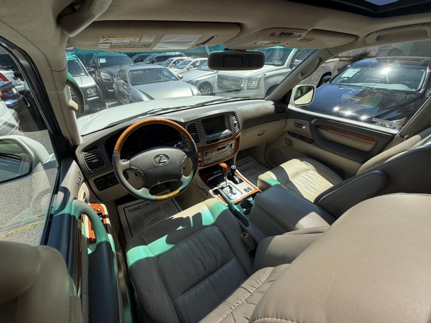 2004 White /Tan Leather Lexus LX 470 Sport Utility (JTJHT00W043) with an 4.7L V8 DOHC 32V engine, 5-Speed Automatic Overdrive transmission, located at 1018 Brunswick Ave, Trenton, NJ, 08638, (609) 989-0900, 40.240086, -74.748085 - Here is a really Rare 1 owner Lexus SUV! Freshly detailed and serviced and ready for another 100k or more miles! Lots of consistent service history on this LX470! Please call Anthony to set an appt. as this will not last long on the lot! 609-273-5100- Photo#44