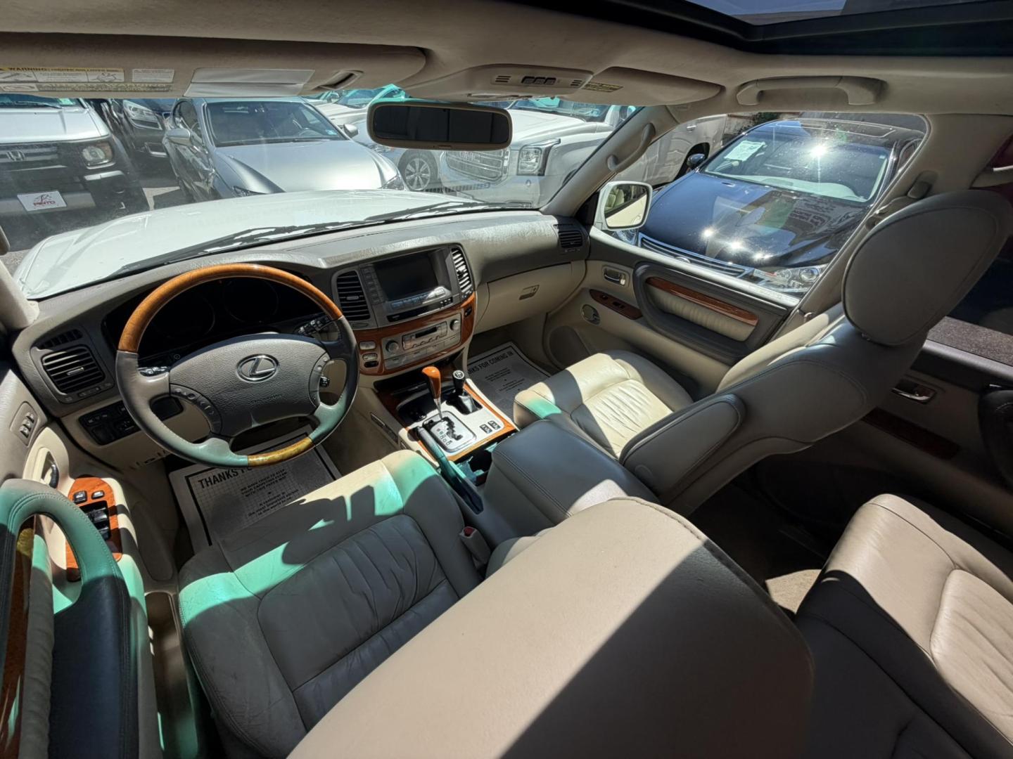 2004 White /Tan Leather Lexus LX 470 Sport Utility (JTJHT00W043) with an 4.7L V8 DOHC 32V engine, 5-Speed Automatic Overdrive transmission, located at 1018 Brunswick Ave, Trenton, NJ, 08638, (609) 989-0900, 40.240086, -74.748085 - Here is a really Rare 1 owner Lexus SUV! Freshly detailed and serviced and ready for another 100k or more miles! Lots of consistent service history on this LX470! Please call Anthony to set an appt. as this will not last long on the lot! 609-273-5100- Photo#45