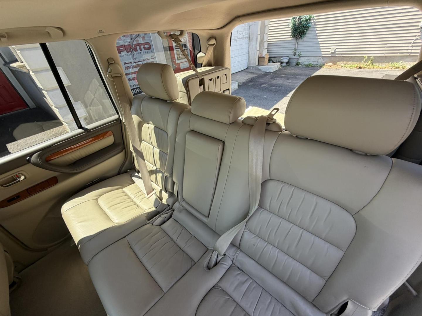 2004 White /Tan Leather Lexus LX 470 Sport Utility (JTJHT00W043) with an 4.7L V8 DOHC 32V engine, 5-Speed Automatic Overdrive transmission, located at 1018 Brunswick Ave, Trenton, NJ, 08638, (609) 989-0900, 40.240086, -74.748085 - Here is a really Rare 1 owner Lexus SUV! Freshly detailed and serviced and ready for another 100k or more miles! Lots of consistent service history on this LX470! Please call Anthony to set an appt. as this will not last long on the lot! 609-273-5100- Photo#48
