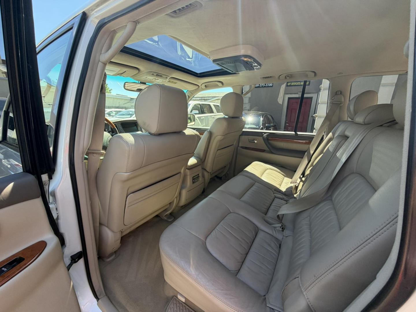 2004 White /Tan Leather Lexus LX 470 Sport Utility (JTJHT00W043) with an 4.7L V8 DOHC 32V engine, 5-Speed Automatic Overdrive transmission, located at 1018 Brunswick Ave, Trenton, NJ, 08638, (609) 989-0900, 40.240086, -74.748085 - Here is a really Rare 1 owner Lexus SUV! Freshly detailed and serviced and ready for another 100k or more miles! Lots of consistent service history on this LX470! Please call Anthony to set an appt. as this will not last long on the lot! 609-273-5100- Photo#50