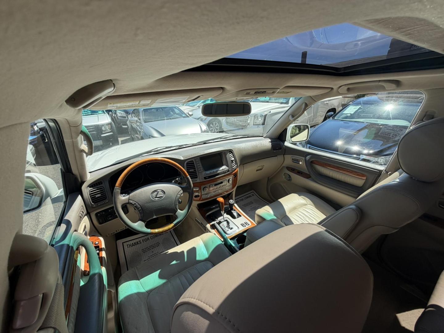 2004 White /Tan Leather Lexus LX 470 Sport Utility (JTJHT00W043) with an 4.7L V8 DOHC 32V engine, 5-Speed Automatic Overdrive transmission, located at 1018 Brunswick Ave, Trenton, NJ, 08638, (609) 989-0900, 40.240086, -74.748085 - Here is a really Rare 1 owner Lexus SUV! Freshly detailed and serviced and ready for another 100k or more miles! Lots of consistent service history on this LX470! Please call Anthony to set an appt. as this will not last long on the lot! 609-273-5100- Photo#51
