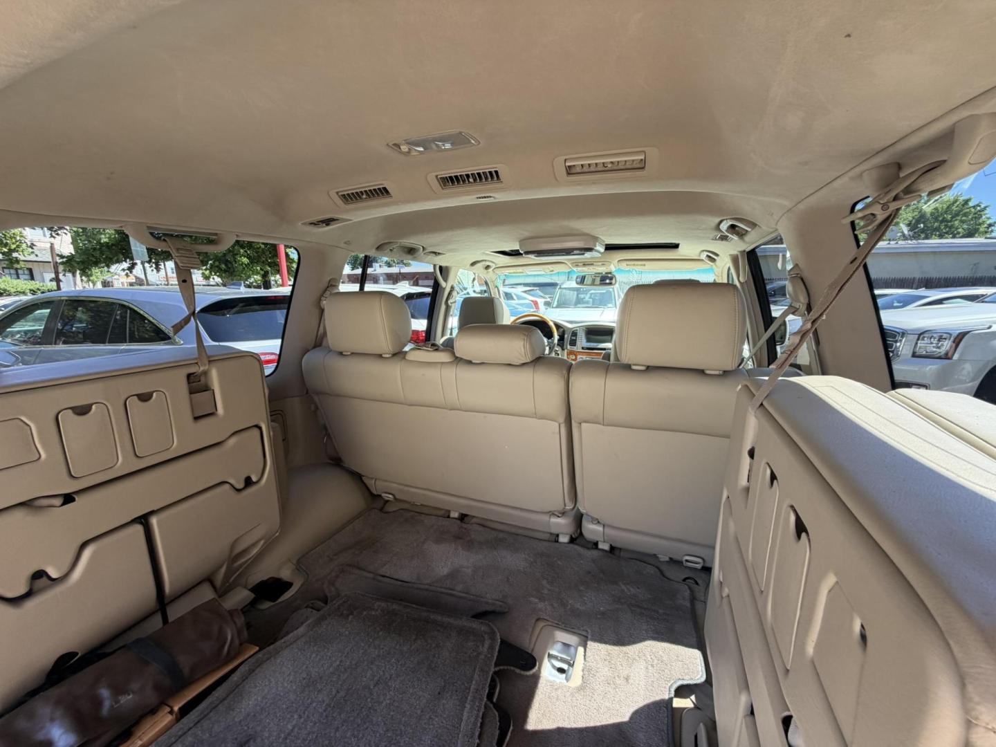 2004 White /Tan Leather Lexus LX 470 Sport Utility (JTJHT00W043) with an 4.7L V8 DOHC 32V engine, 5-Speed Automatic Overdrive transmission, located at 1018 Brunswick Ave, Trenton, NJ, 08638, (609) 989-0900, 40.240086, -74.748085 - Here is a really Rare 1 owner Lexus SUV! Freshly detailed and serviced and ready for another 100k or more miles! Lots of consistent service history on this LX470! Please call Anthony to set an appt. as this will not last long on the lot! 609-273-5100- Photo#52