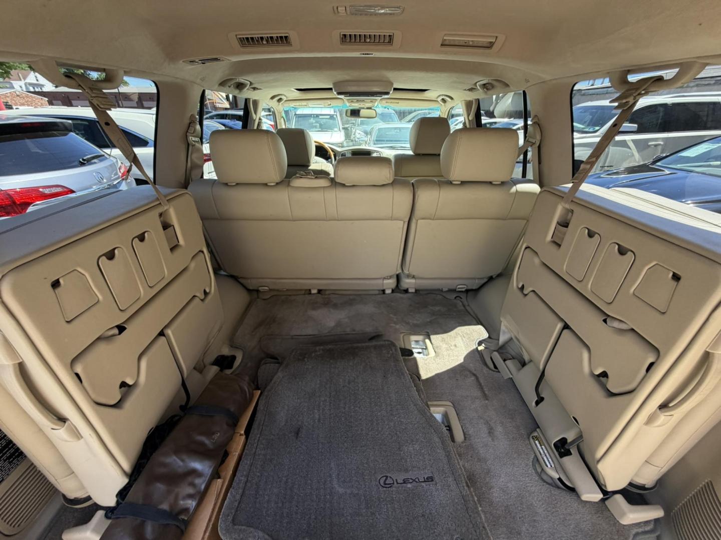 2004 White /Tan Leather Lexus LX 470 Sport Utility (JTJHT00W043) with an 4.7L V8 DOHC 32V engine, 5-Speed Automatic Overdrive transmission, located at 1018 Brunswick Ave, Trenton, NJ, 08638, (609) 989-0900, 40.240086, -74.748085 - Here is a really Rare 1 owner Lexus SUV! Freshly detailed and serviced and ready for another 100k or more miles! Lots of consistent service history on this LX470! Please call Anthony to set an appt. as this will not last long on the lot! 609-273-5100- Photo#53