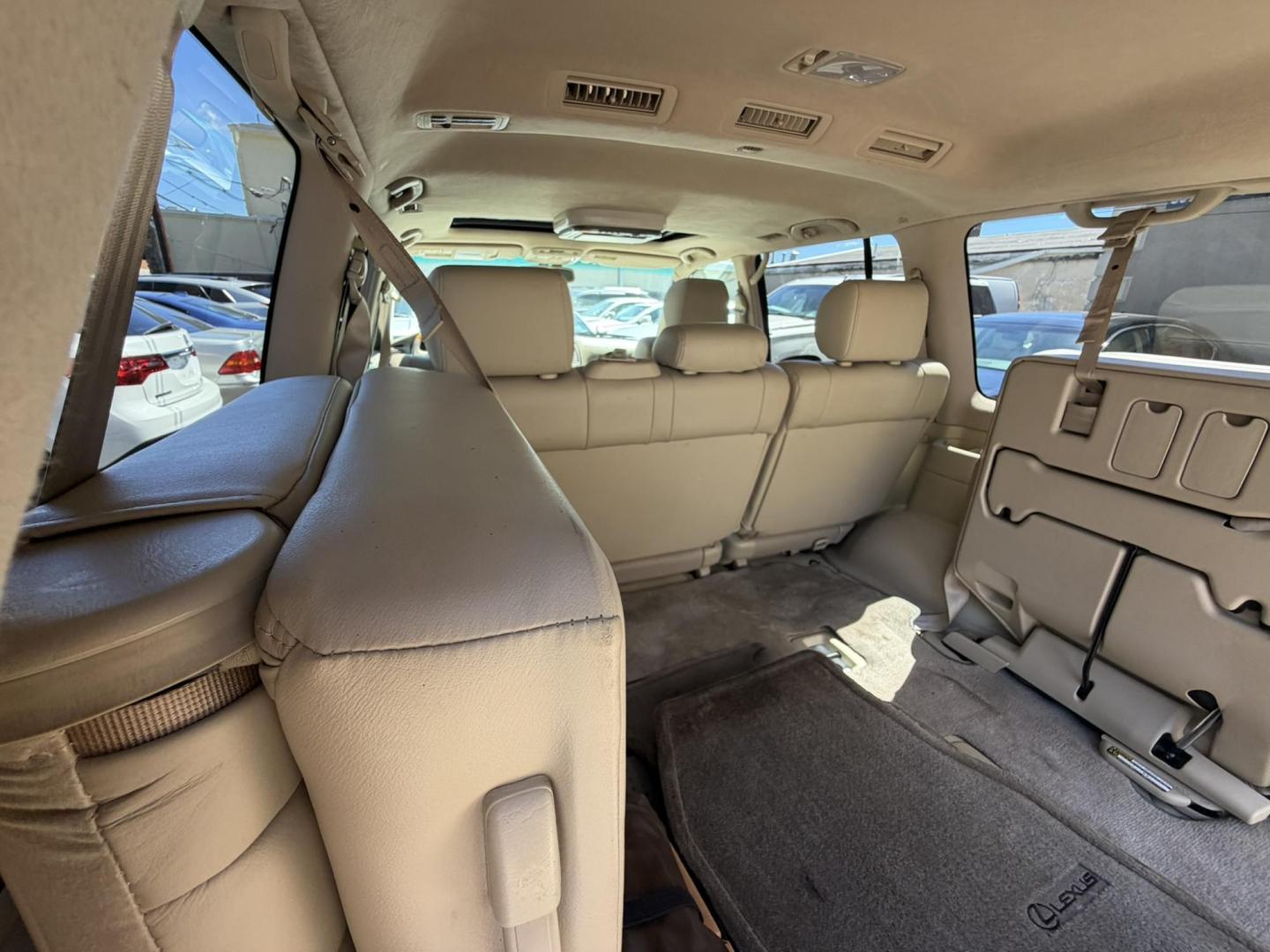 2004 White /Tan Leather Lexus LX 470 Sport Utility (JTJHT00W043) with an 4.7L V8 DOHC 32V engine, 5-Speed Automatic Overdrive transmission, located at 1018 Brunswick Ave, Trenton, NJ, 08638, (609) 989-0900, 40.240086, -74.748085 - Here is a really Rare 1 owner Lexus SUV! Freshly detailed and serviced and ready for another 100k or more miles! Lots of consistent service history on this LX470! Please call Anthony to set an appt. as this will not last long on the lot! 609-273-5100- Photo#54