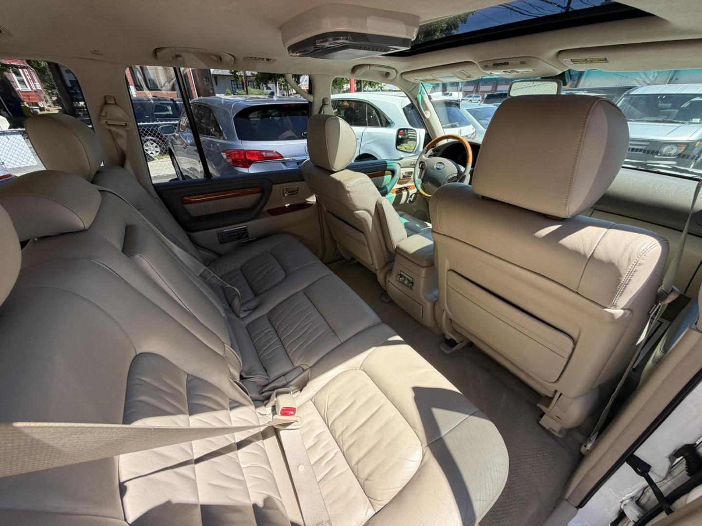 2004 White /Tan Leather Lexus LX 470 Sport Utility (JTJHT00W043) with an 4.7L V8 DOHC 32V engine, 5-Speed Automatic Overdrive transmission, located at 1018 Brunswick Ave, Trenton, NJ, 08638, (609) 989-0900, 40.240086, -74.748085 - Here is a really Rare 1 owner Lexus SUV! Freshly detailed and serviced and ready for another 100k or more miles! Lots of consistent service history on this LX470! Please call Anthony to set an appt. as this will not last long on the lot! 609-273-5100- Photo#55