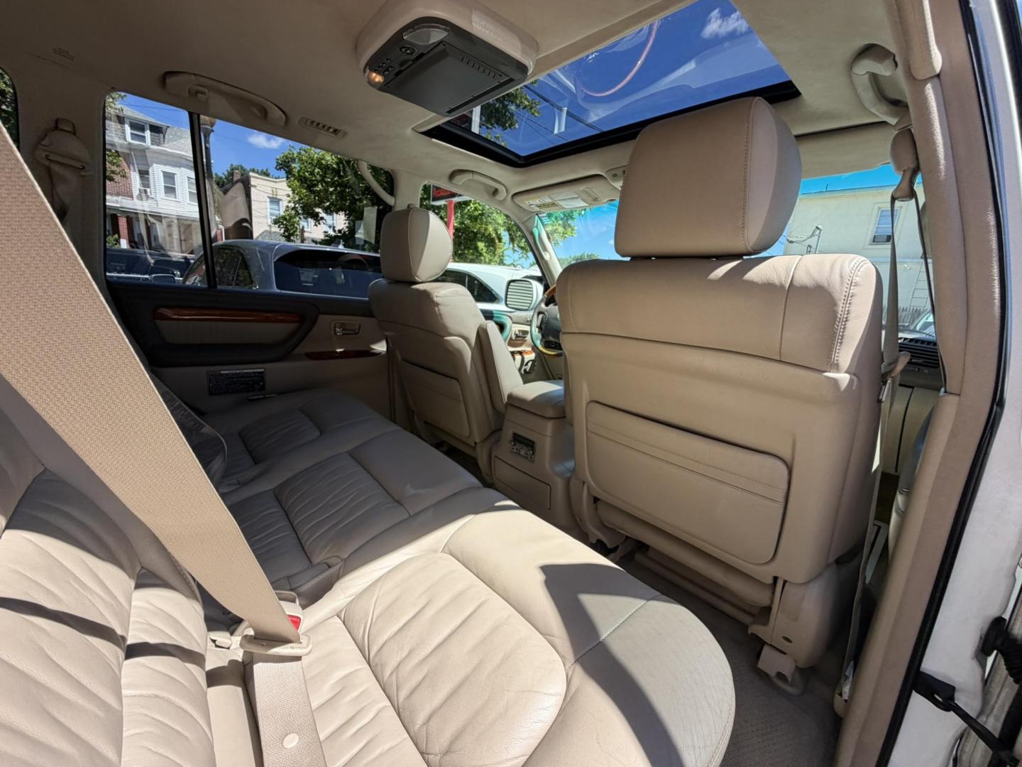 2004 White /Tan Leather Lexus LX 470 Sport Utility (JTJHT00W043) with an 4.7L V8 DOHC 32V engine, 5-Speed Automatic Overdrive transmission, located at 1018 Brunswick Ave, Trenton, NJ, 08638, (609) 989-0900, 40.240086, -74.748085 - Here is a really Rare 1 owner Lexus SUV! Freshly detailed and serviced and ready for another 100k or more miles! Lots of consistent service history on this LX470! Please call Anthony to set an appt. as this will not last long on the lot! 609-273-5100- Photo#56