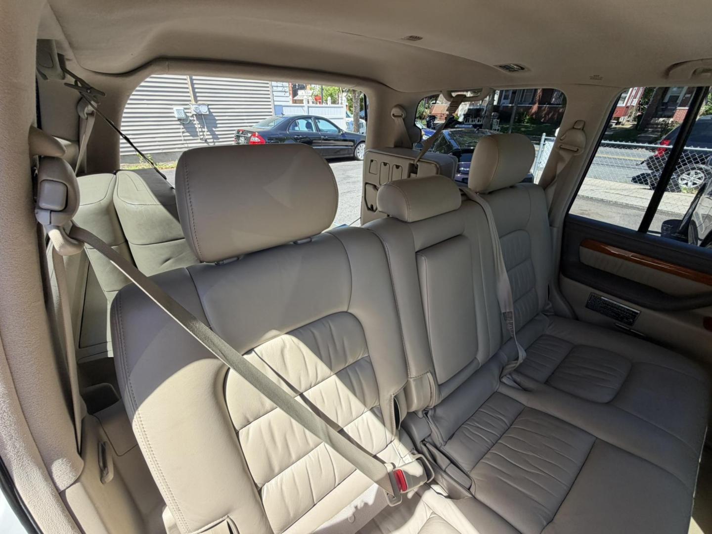 2004 White /Tan Leather Lexus LX 470 Sport Utility (JTJHT00W043) with an 4.7L V8 DOHC 32V engine, 5-Speed Automatic Overdrive transmission, located at 1018 Brunswick Ave, Trenton, NJ, 08638, (609) 989-0900, 40.240086, -74.748085 - Here is a really Rare 1 owner Lexus SUV! Freshly detailed and serviced and ready for another 100k or more miles! Lots of consistent service history on this LX470! Please call Anthony to set an appt. as this will not last long on the lot! 609-273-5100- Photo#57