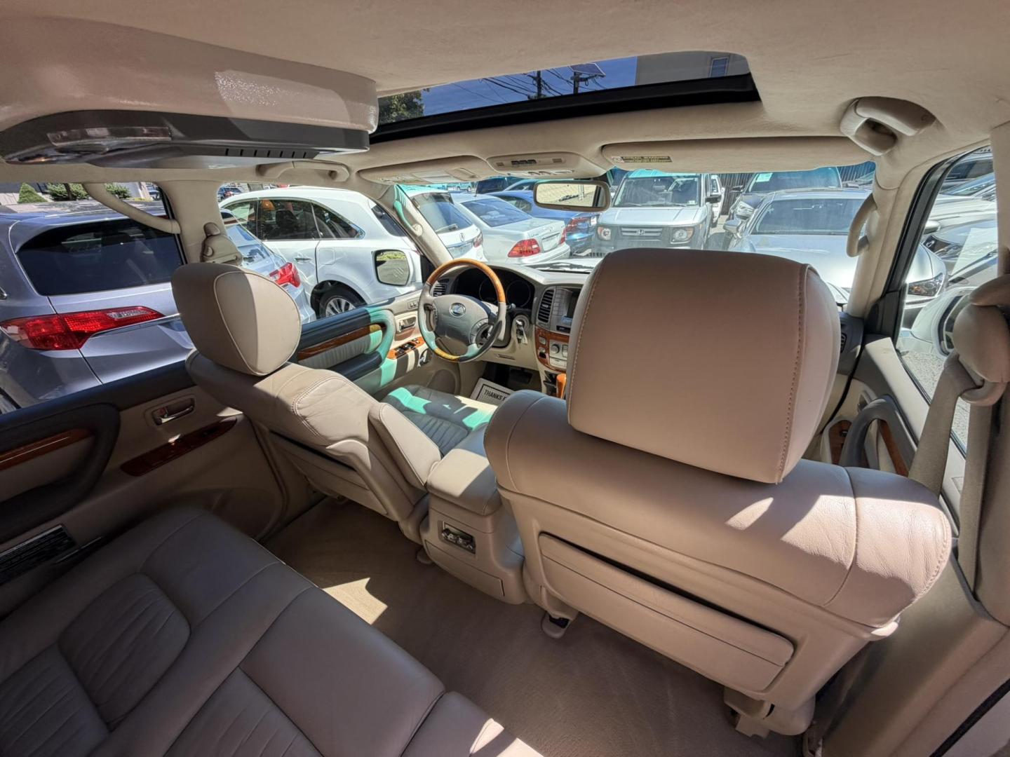 2004 White /Tan Leather Lexus LX 470 Sport Utility (JTJHT00W043) with an 4.7L V8 DOHC 32V engine, 5-Speed Automatic Overdrive transmission, located at 1018 Brunswick Ave, Trenton, NJ, 08638, (609) 989-0900, 40.240086, -74.748085 - Here is a really Rare 1 owner Lexus SUV! Freshly detailed and serviced and ready for another 100k or more miles! Lots of consistent service history on this LX470! Please call Anthony to set an appt. as this will not last long on the lot! 609-273-5100- Photo#58