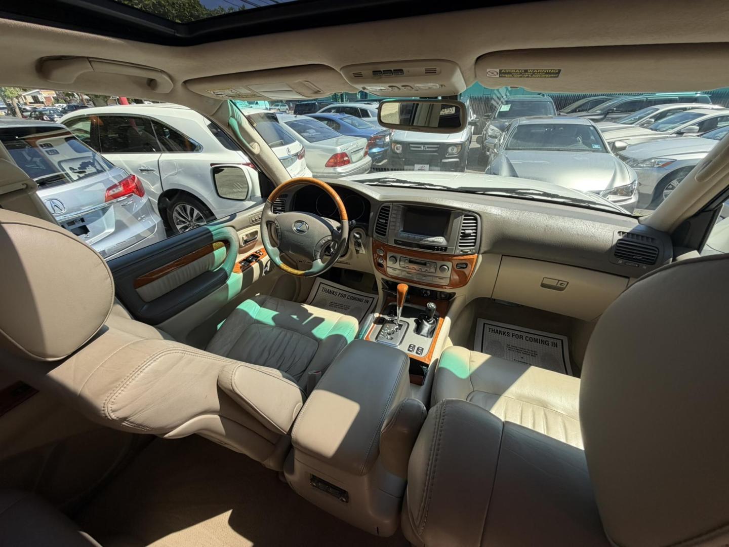 2004 White /Tan Leather Lexus LX 470 Sport Utility (JTJHT00W043) with an 4.7L V8 DOHC 32V engine, 5-Speed Automatic Overdrive transmission, located at 1018 Brunswick Ave, Trenton, NJ, 08638, (609) 989-0900, 40.240086, -74.748085 - Here is a really Rare 1 owner Lexus SUV! Freshly detailed and serviced and ready for another 100k or more miles! Lots of consistent service history on this LX470! Please call Anthony to set an appt. as this will not last long on the lot! 609-273-5100- Photo#59