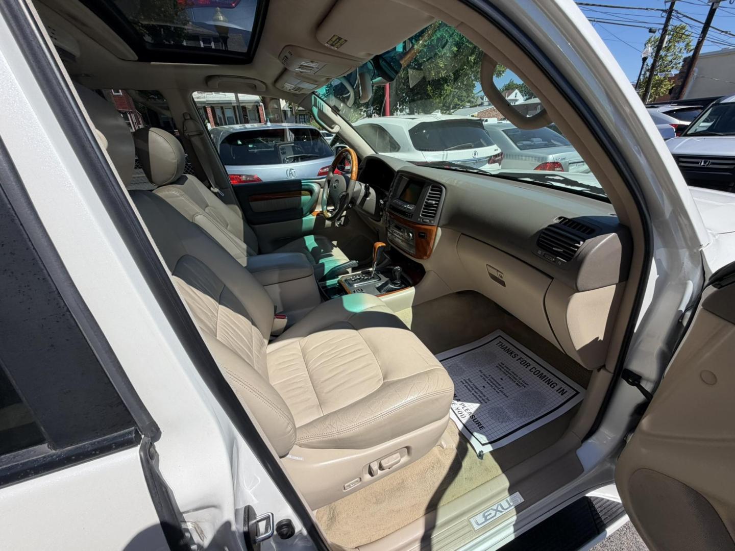 2004 White /Tan Leather Lexus LX 470 Sport Utility (JTJHT00W043) with an 4.7L V8 DOHC 32V engine, 5-Speed Automatic Overdrive transmission, located at 1018 Brunswick Ave, Trenton, NJ, 08638, (609) 989-0900, 40.240086, -74.748085 - Here is a really Rare 1 owner Lexus SUV! Freshly detailed and serviced and ready for another 100k or more miles! Lots of consistent service history on this LX470! Please call Anthony to set an appt. as this will not last long on the lot! 609-273-5100- Photo#61