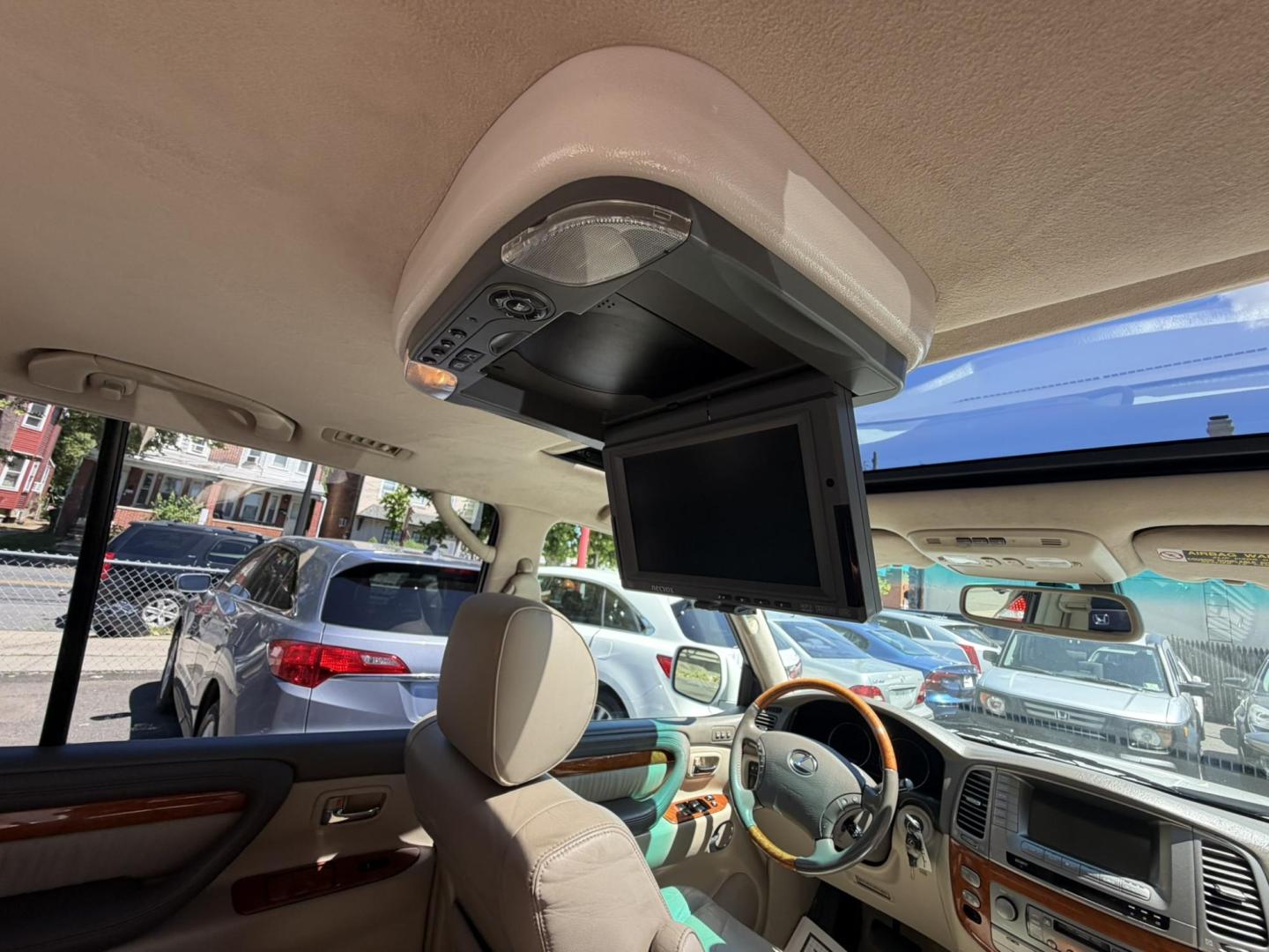2004 White /Tan Leather Lexus LX 470 Sport Utility (JTJHT00W043) with an 4.7L V8 DOHC 32V engine, 5-Speed Automatic Overdrive transmission, located at 1018 Brunswick Ave, Trenton, NJ, 08638, (609) 989-0900, 40.240086, -74.748085 - Here is a really Rare 1 owner Lexus SUV! Freshly detailed and serviced and ready for another 100k or more miles! Lots of consistent service history on this LX470! Please call Anthony to set an appt. as this will not last long on the lot! 609-273-5100- Photo#60