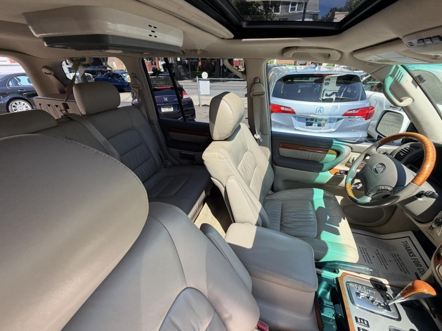 2004 White /Tan Leather Lexus LX 470 Sport Utility (JTJHT00W043) with an 4.7L V8 DOHC 32V engine, 5-Speed Automatic Overdrive transmission, located at 1018 Brunswick Ave, Trenton, NJ, 08638, (609) 989-0900, 40.240086, -74.748085 - Here is a really Rare 1 owner Lexus SUV! Freshly detailed and serviced and ready for another 100k or more miles! Lots of consistent service history on this LX470! Please call Anthony to set an appt. as this will not last long on the lot! 609-273-5100- Photo#65
