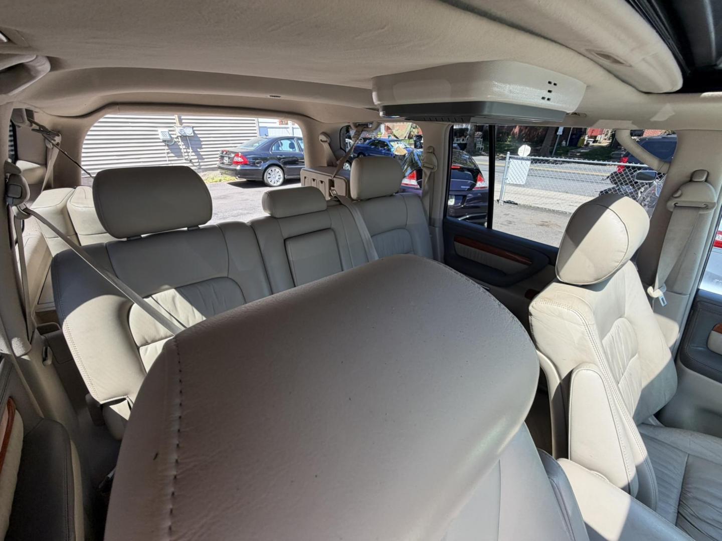 2004 White /Tan Leather Lexus LX 470 Sport Utility (JTJHT00W043) with an 4.7L V8 DOHC 32V engine, 5-Speed Automatic Overdrive transmission, located at 1018 Brunswick Ave, Trenton, NJ, 08638, (609) 989-0900, 40.240086, -74.748085 - Here is a really Rare 1 owner Lexus SUV! Freshly detailed and serviced and ready for another 100k or more miles! Lots of consistent service history on this LX470! Please call Anthony to set an appt. as this will not last long on the lot! 609-273-5100- Photo#64