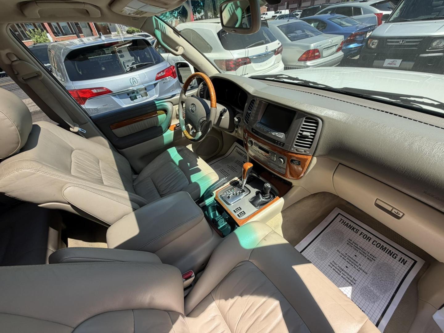 2004 White /Tan Leather Lexus LX 470 Sport Utility (JTJHT00W043) with an 4.7L V8 DOHC 32V engine, 5-Speed Automatic Overdrive transmission, located at 1018 Brunswick Ave, Trenton, NJ, 08638, (609) 989-0900, 40.240086, -74.748085 - Here is a really Rare 1 owner Lexus SUV! Freshly detailed and serviced and ready for another 100k or more miles! Lots of consistent service history on this LX470! Please call Anthony to set an appt. as this will not last long on the lot! 609-273-5100- Photo#66