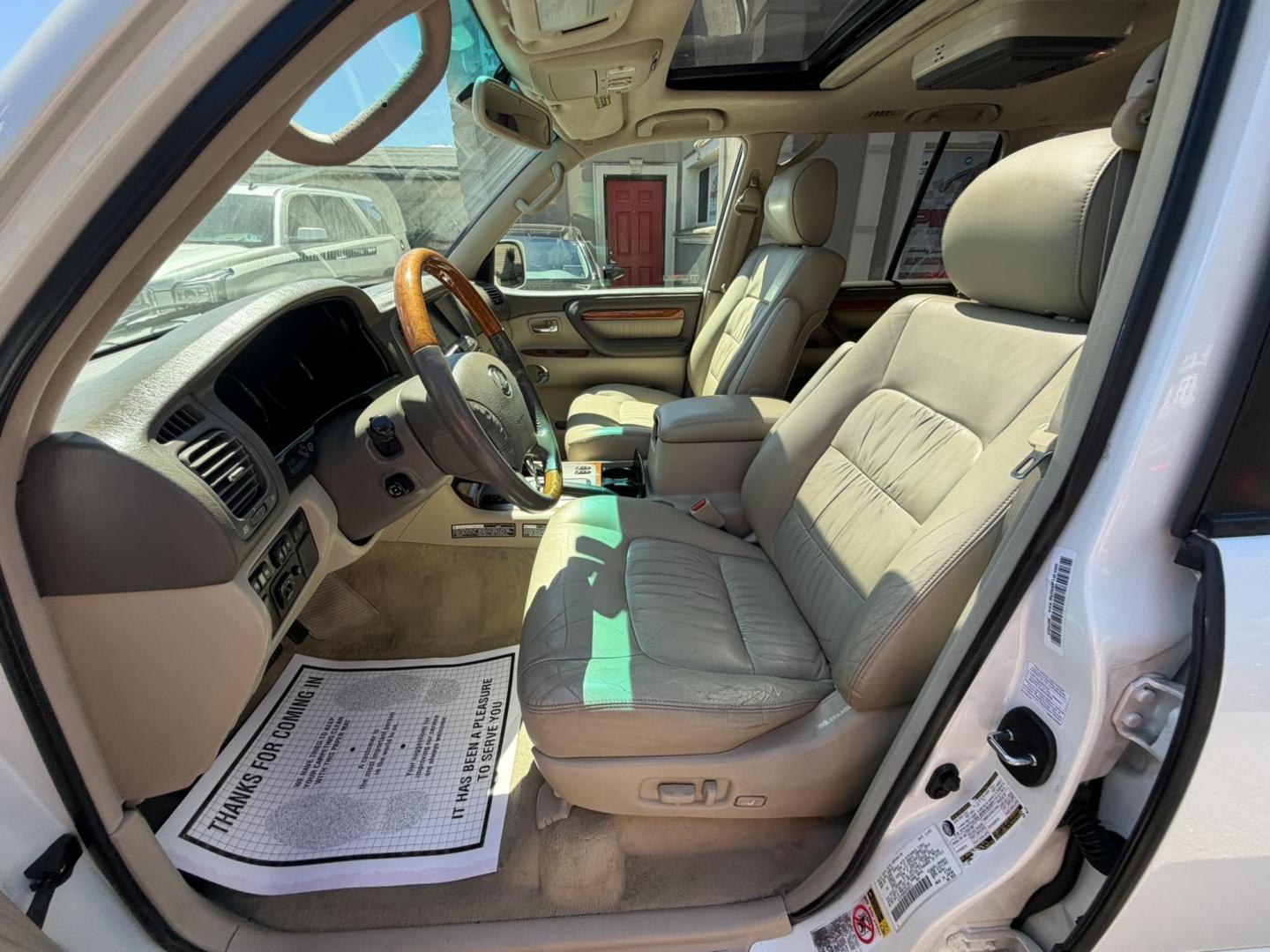 2004 White /Tan Leather Lexus LX 470 Sport Utility (JTJHT00W043) with an 4.7L V8 DOHC 32V engine, 5-Speed Automatic Overdrive transmission, located at 1018 Brunswick Ave, Trenton, NJ, 08638, (609) 989-0900, 40.240086, -74.748085 - Here is a really Rare 1 owner Lexus SUV! Freshly detailed and serviced and ready for another 100k or more miles! Lots of consistent service history on this LX470! Please call Anthony to set an appt. as this will not last long on the lot! 609-273-5100- Photo#67