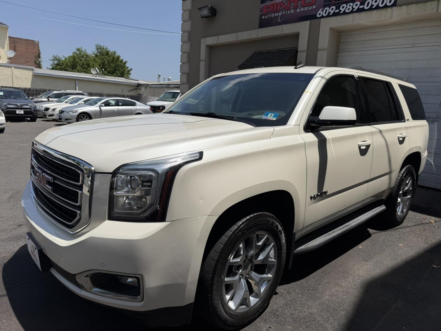 2015 White /Tan GMC Yukon SLT 4WD (1GKS2BKC6FR) with an 5.3L V8 OHV 16V FFV engine, 6-Speed Automatic transmission, located at 1018 Brunswick Ave, Trenton, NJ, 08638, (609) 989-0900, 40.240086, -74.748085 - Here is a super clean and well serviced up GMC Yukon! Fully Loaded and a great color combo for the exterior and interior of this SUV. A must see and drive ASAP as this vehicle will not last long at all, please call Anthony to set up an appt. 609-273-5100- Photo#2