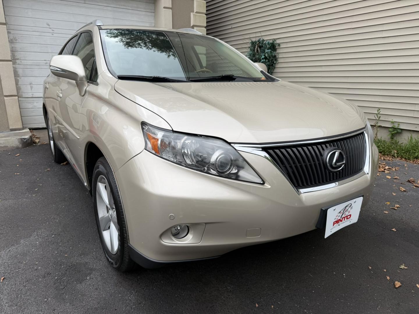 2011 Gold /Tan Leather Lexus RX 350 AWD (2T2BK1BA9BC) with an 3.5L V6 DOHC 24V engine, 5A transmission, located at 1018 Brunswick Ave, Trenton, NJ, 08638, (609) 989-0900, 40.240086, -74.748085 - A really clean and well maintained Lexus RX, a must see and drive ASAP! Financing available, call Anthony to set up an appointment to see it, 609-273-5100- Photo#2